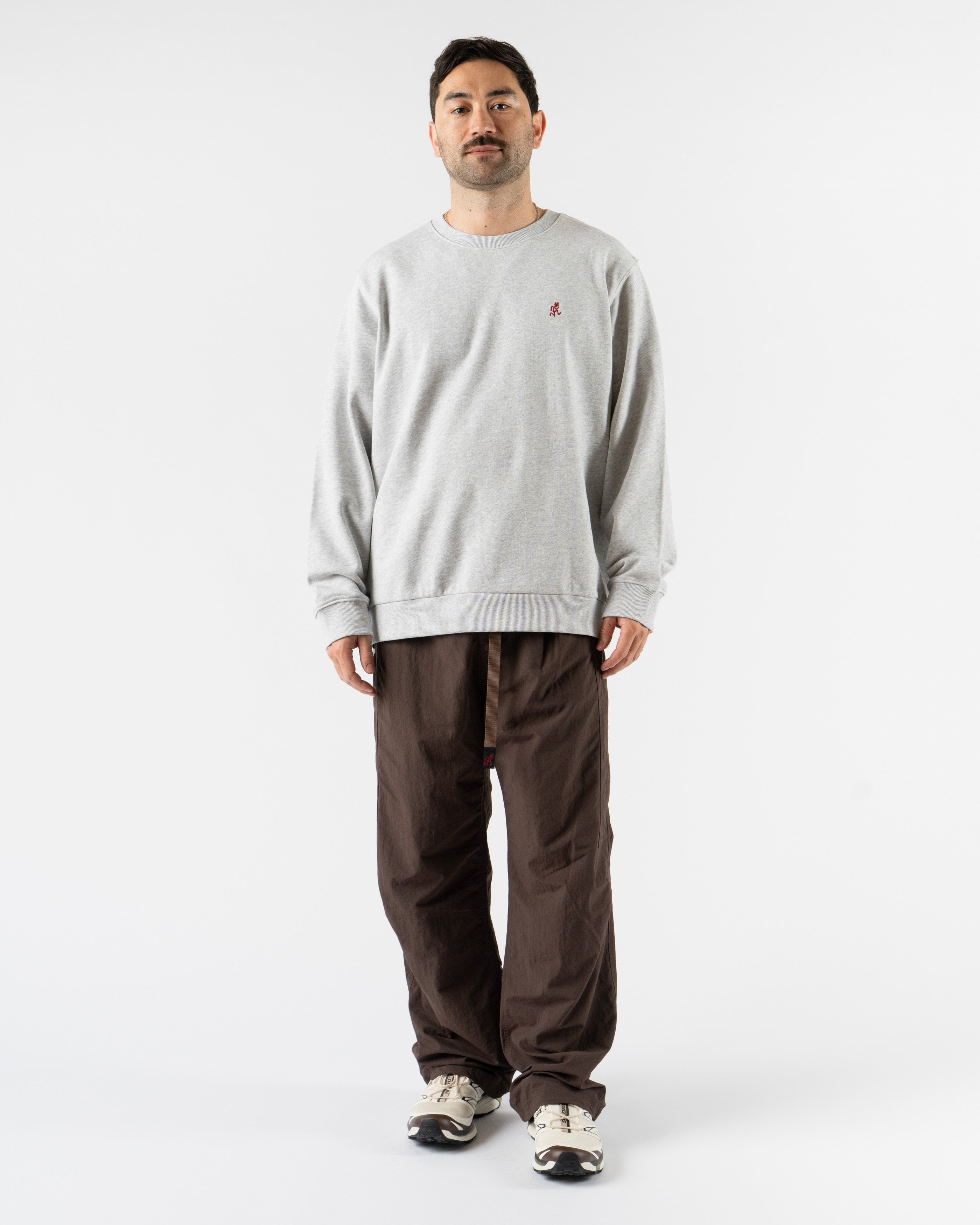 Gramicci lightweight nylon pants in Deep Brown styled for outdoor and streetwear versatility