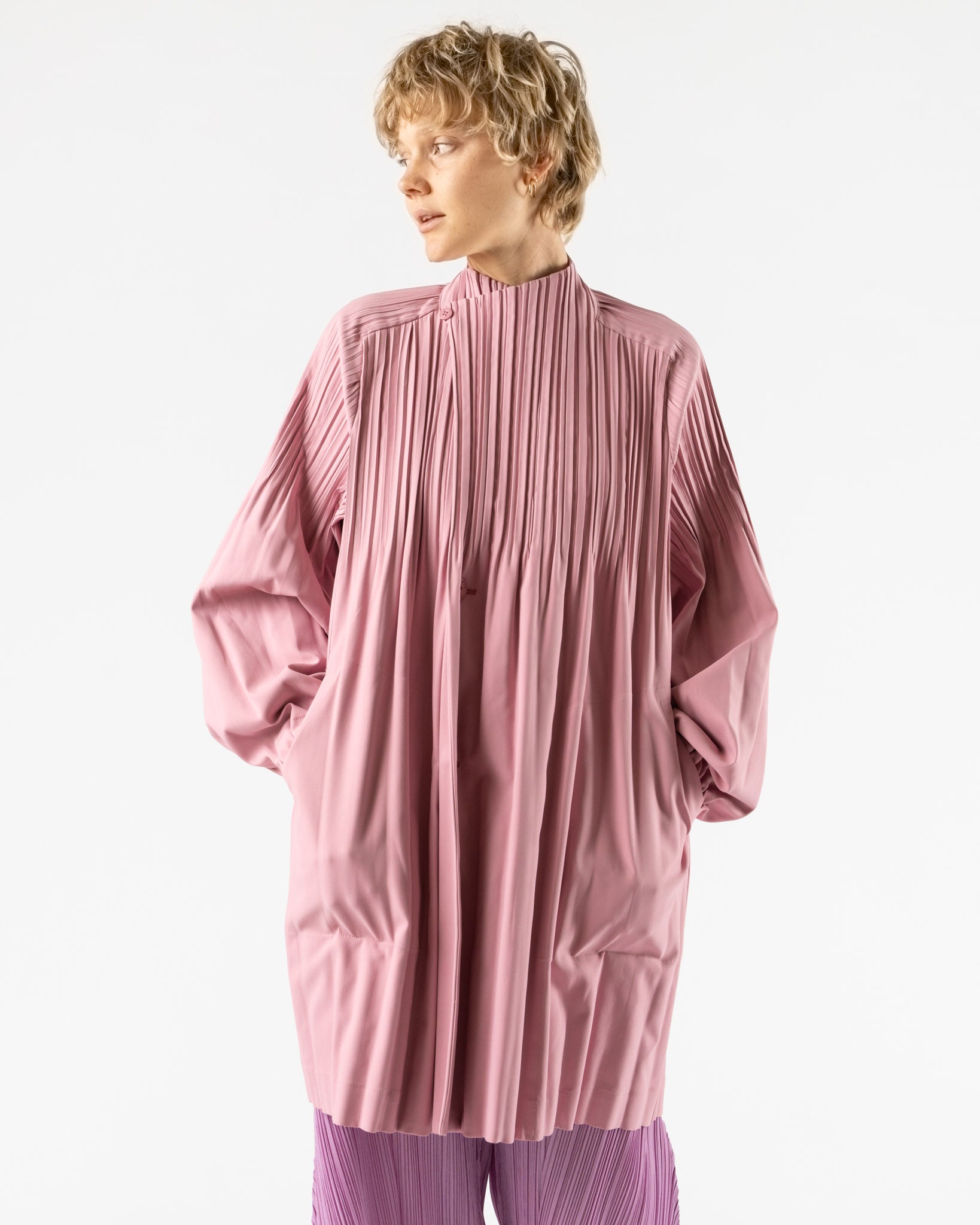 pleats please long sleeve dress Pleats Please Issey Miyake Smooth Coat in Rose Pink Curated at Jake and  Jones