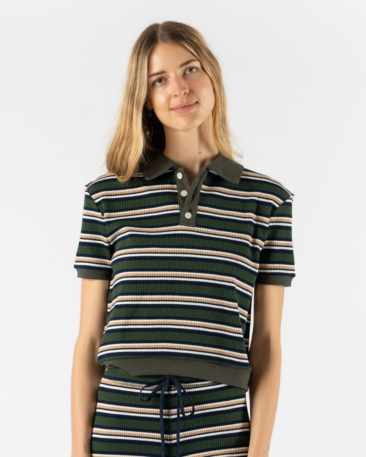 Rhodolirion Polo Shirt in Olive Random Stripe Curated at Jake and 