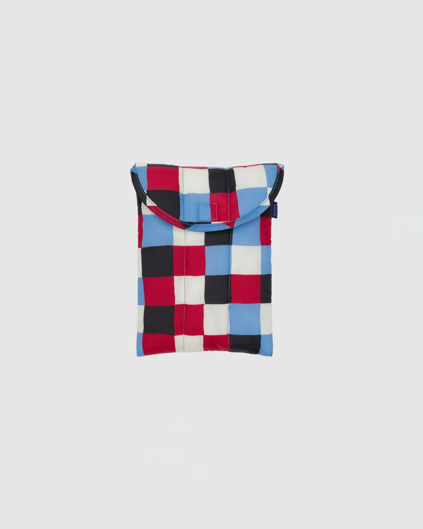 Checkered pouch with red, blue, and black pattern on a white background