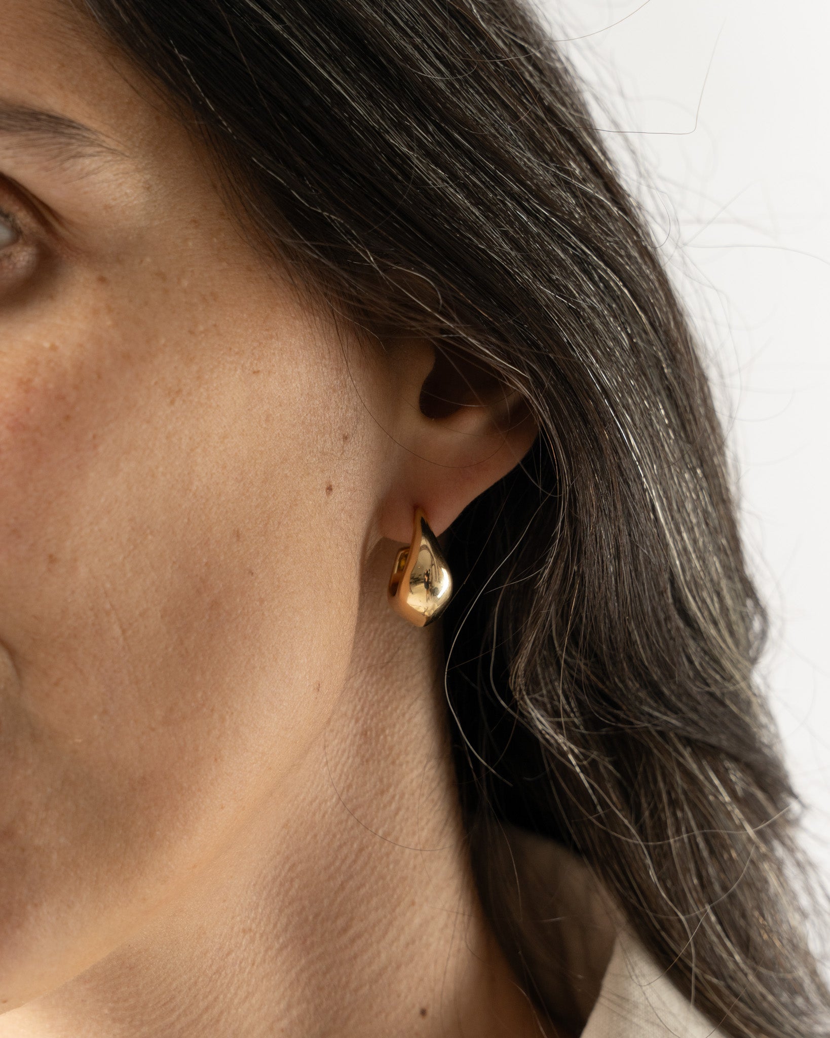 Lemaire Curved Mini Drop Hoops in Gold