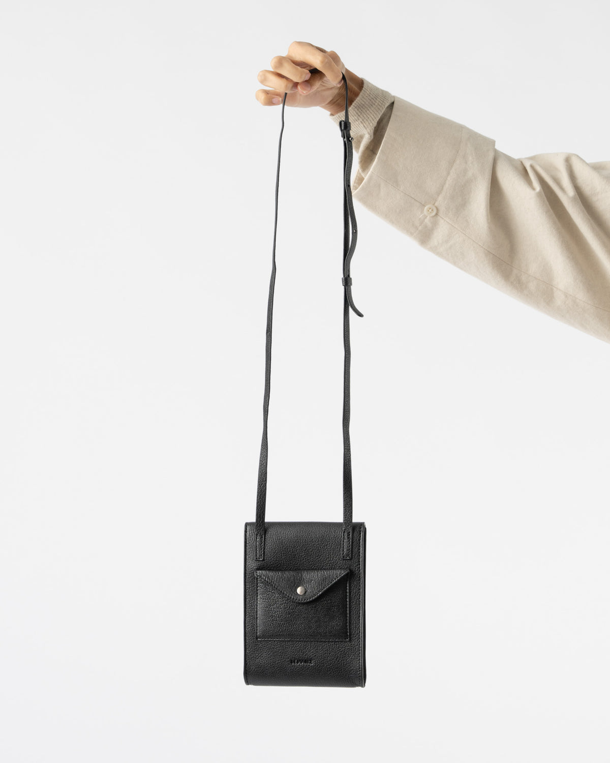 Lemaire Enveloppe with Strap in Black Curated at Jake and Jones