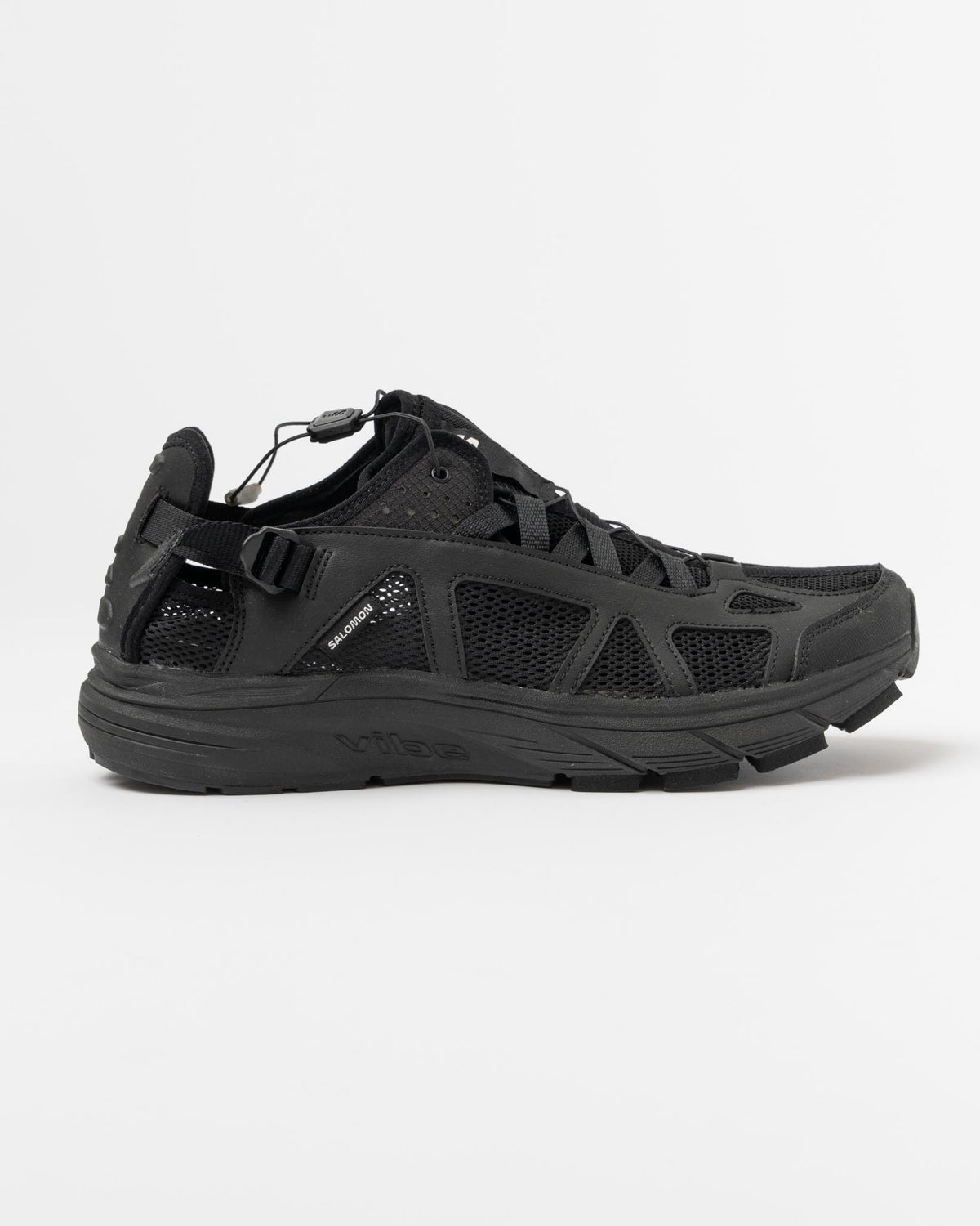 Salomon Techsonic Sneaker in Black/Black/Vanilla Curated at Jake 