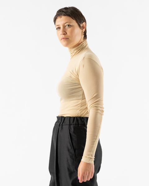 Auralee High Gauge Sheer Rib Turtleneck in Light Beige