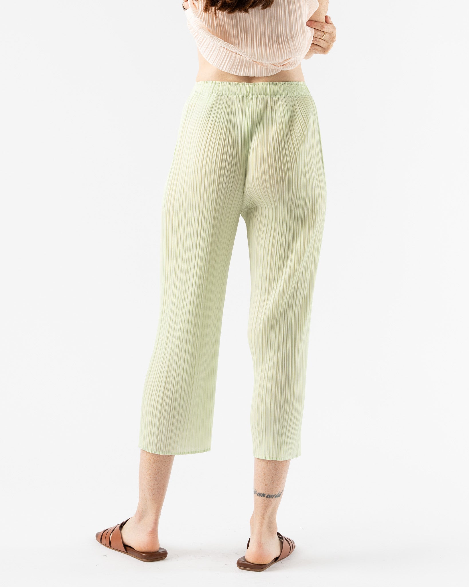 Pleats-Please-by-Issey-Miyake-May-Monthly-Colors-Pant-in-Pastel-Green-Santa-Barbara-Boutique-Jake-and-Jones-Sustainable-Fashion