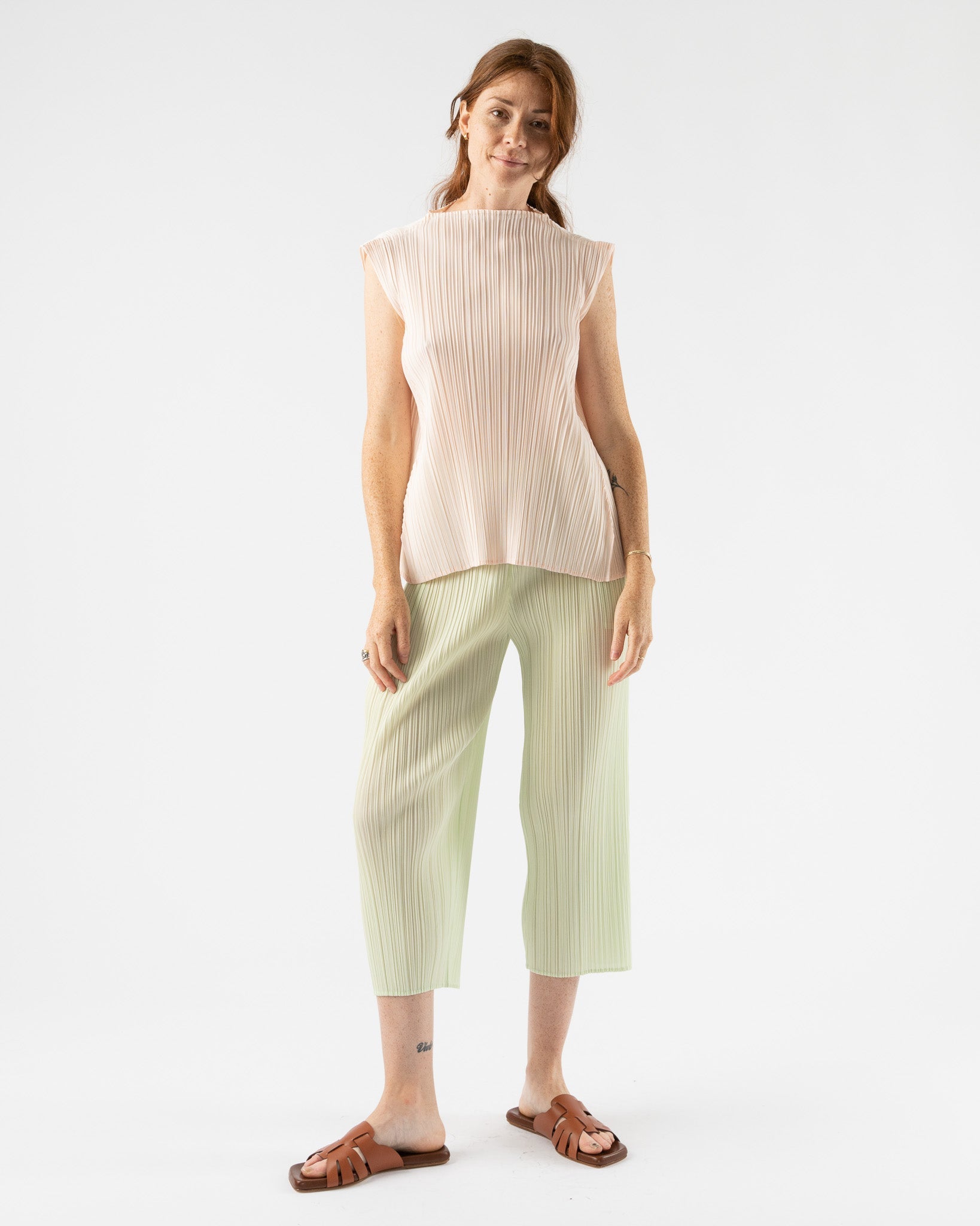 Pleats-Please-by-Issey-Miyake-May-Monthly-Colors-Pant-in-Pastel-Green-Santa-Barbara-Boutique-Jake-and-Jones-Sustainable-Fashion