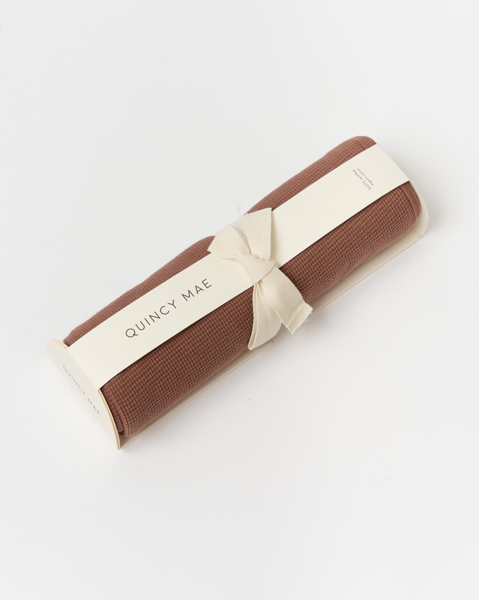 quincy-mae-waffle-baby-blanket-in-pecan-fw22d1-jake-and-jones-a-santa-barbara-boutique-curated-slow-fashion