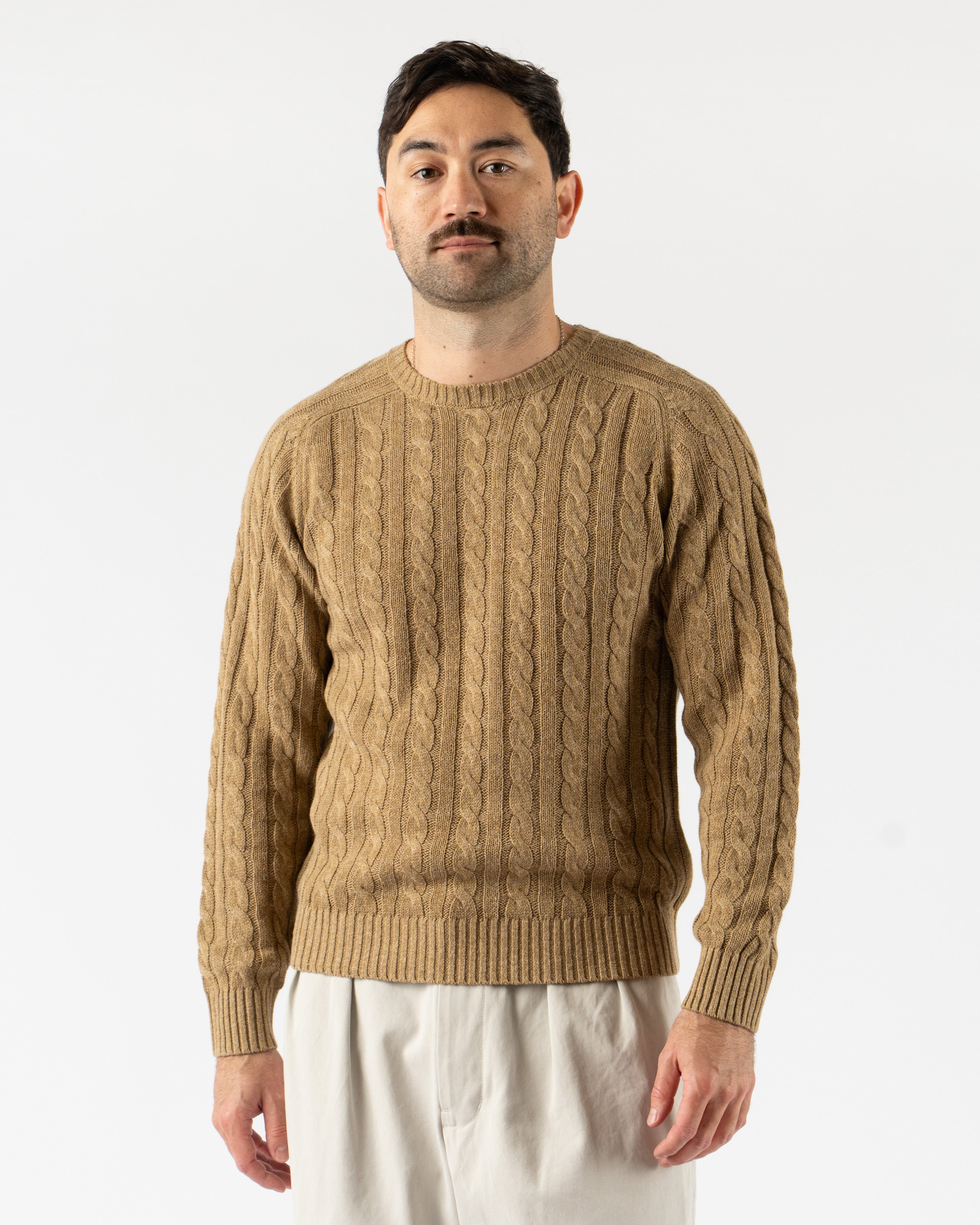  Beams Plus Cable Knit Crewneck in Cotton Linen Khaki – relaxed-fit crewneck sweater crafted from a breathable cotton-linen blend, featuring a classic cable knit design, ribbed edges, and a soft khaki hue for effortless layering.