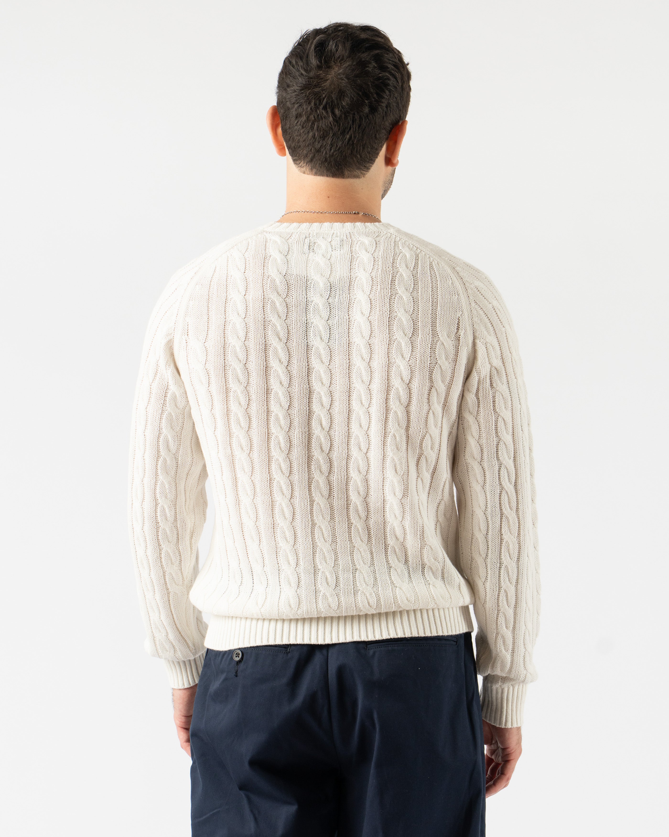 Beams Plus Cable Knit Crewneck in Cotton Linen White – classic crewneck sweater featuring a textured cable knit design, made from a breathable cotton-linen blend with ribbed cuffs and hem, perfect for lightweight layering in a crisp white tone.