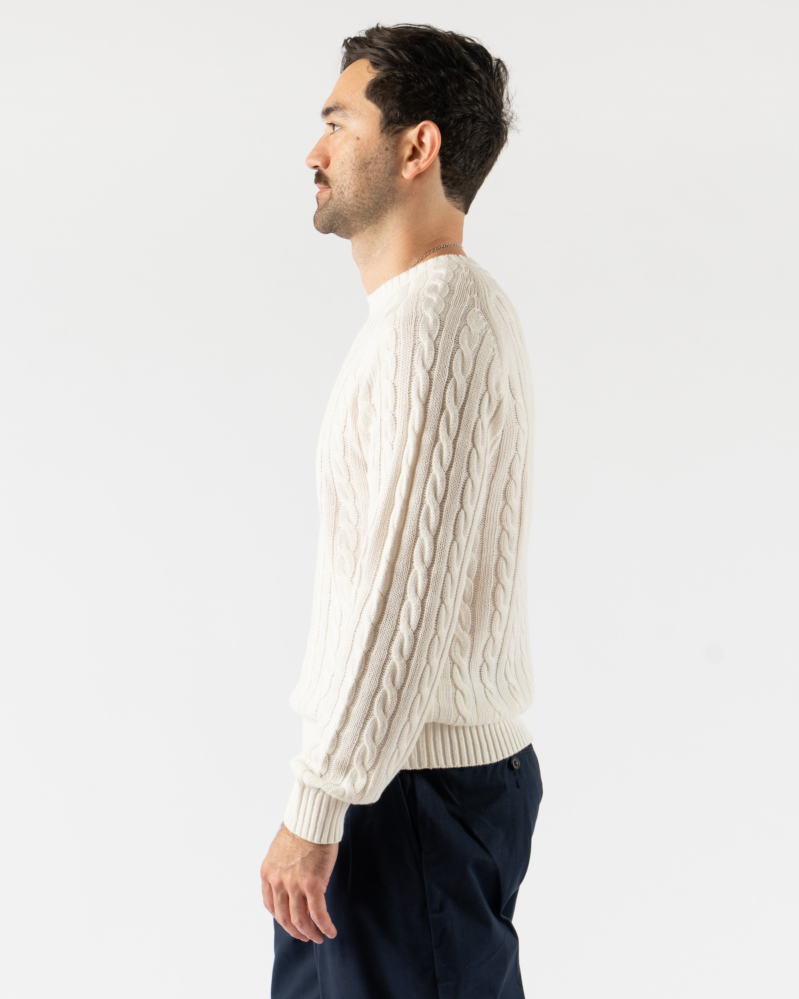 Beams Plus Cable Knit Crewneck in Cotton Linen White – classic crewneck sweater featuring a textured cable knit design, made from a breathable cotton-linen blend with ribbed cuffs and hem, perfect for lightweight layering in a crisp white tone.