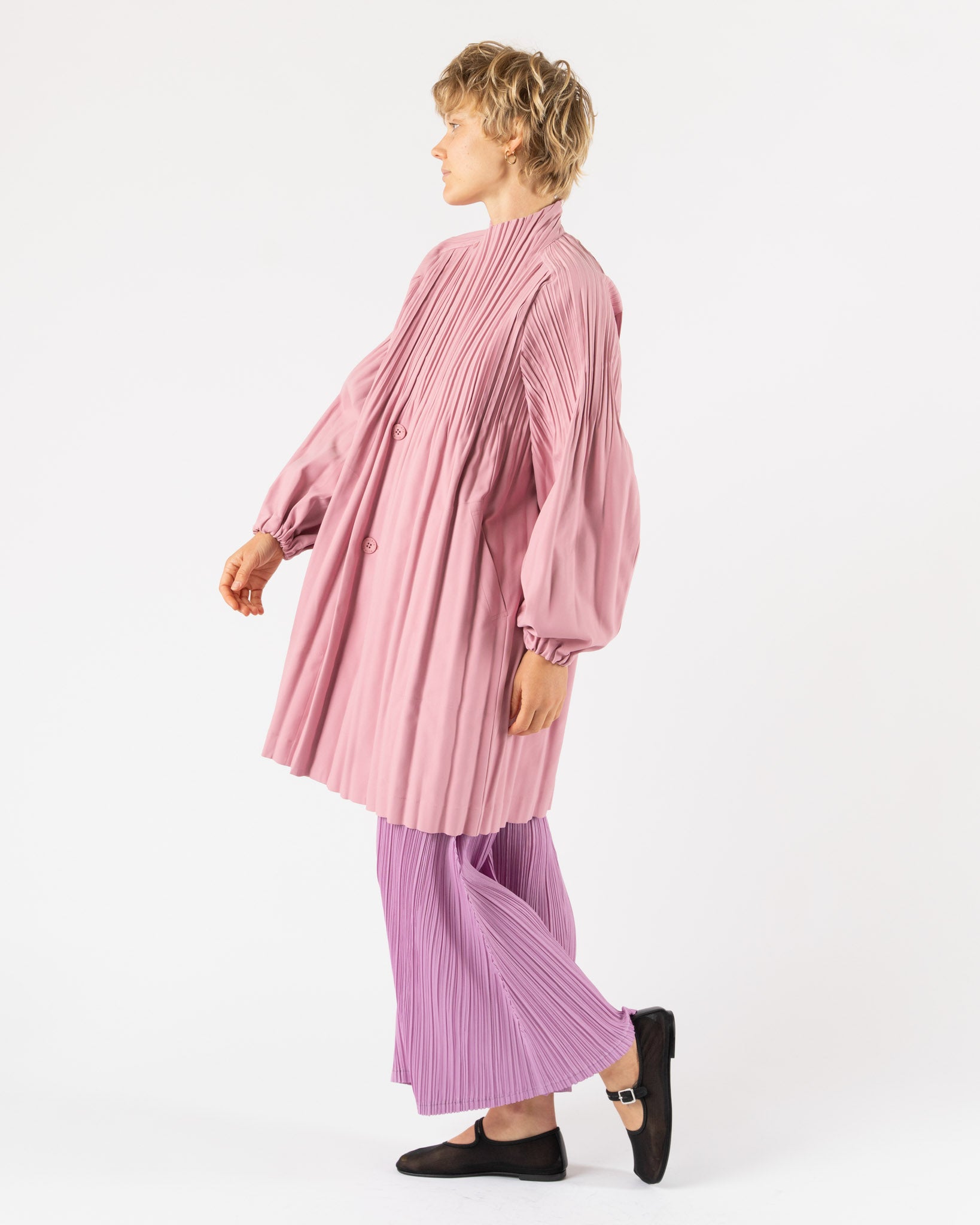 Pleats Please Issey Miyake Smooth Coat in Rose Pink Curated at