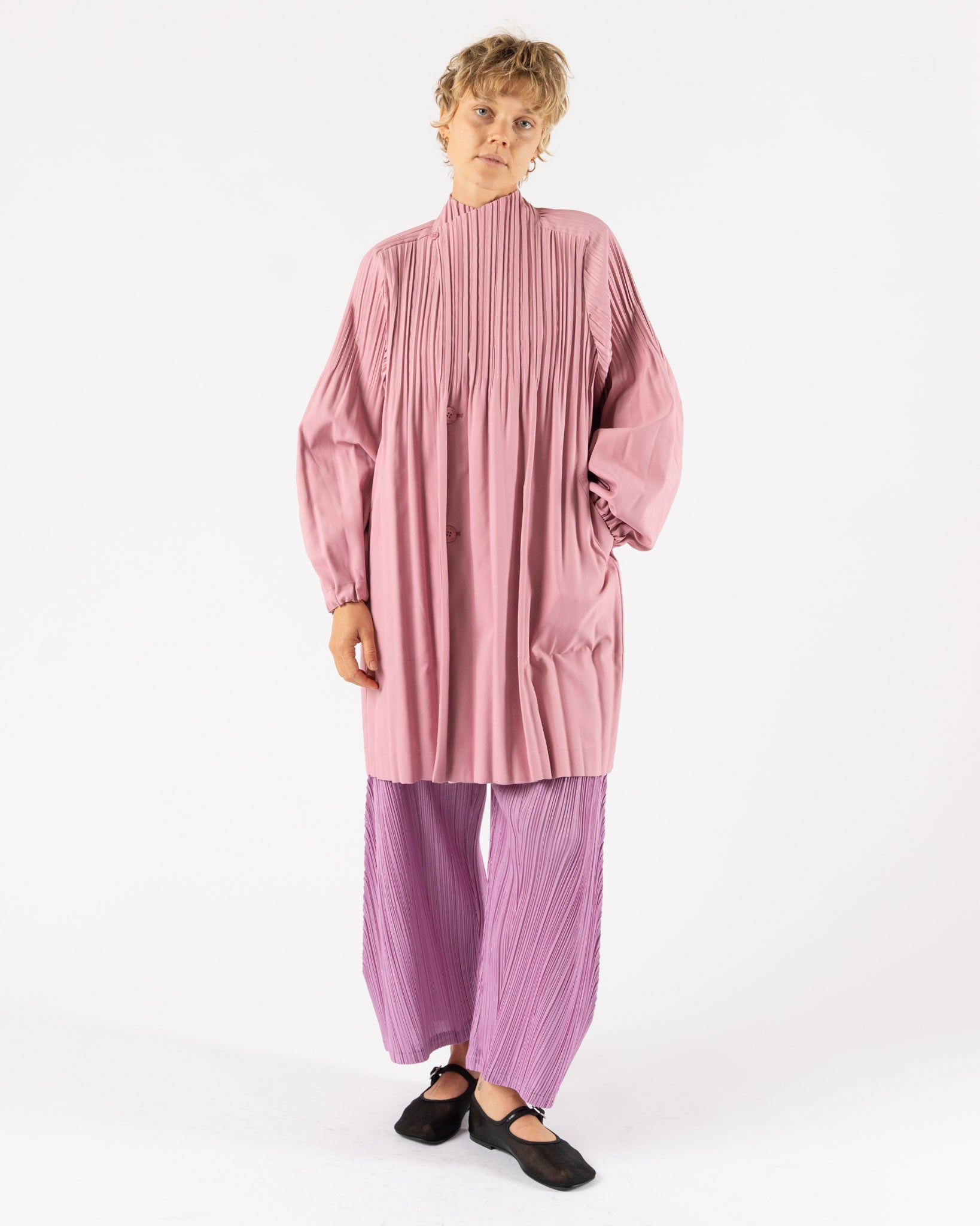 Pleats Please Issey Miyake Smooth Coat in Rose Pink Curated at