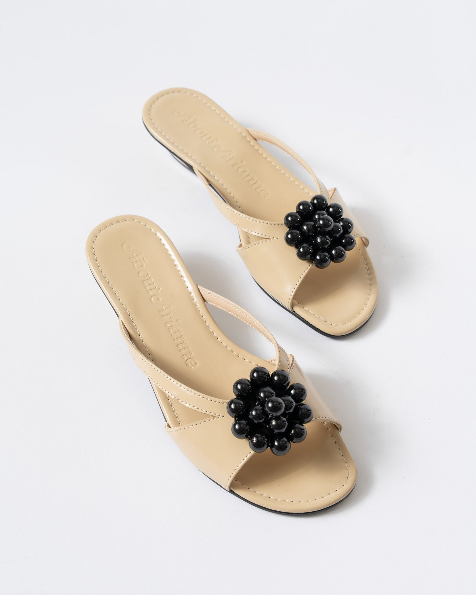 About Arianne Mina in Black Curated at Jake and Jones