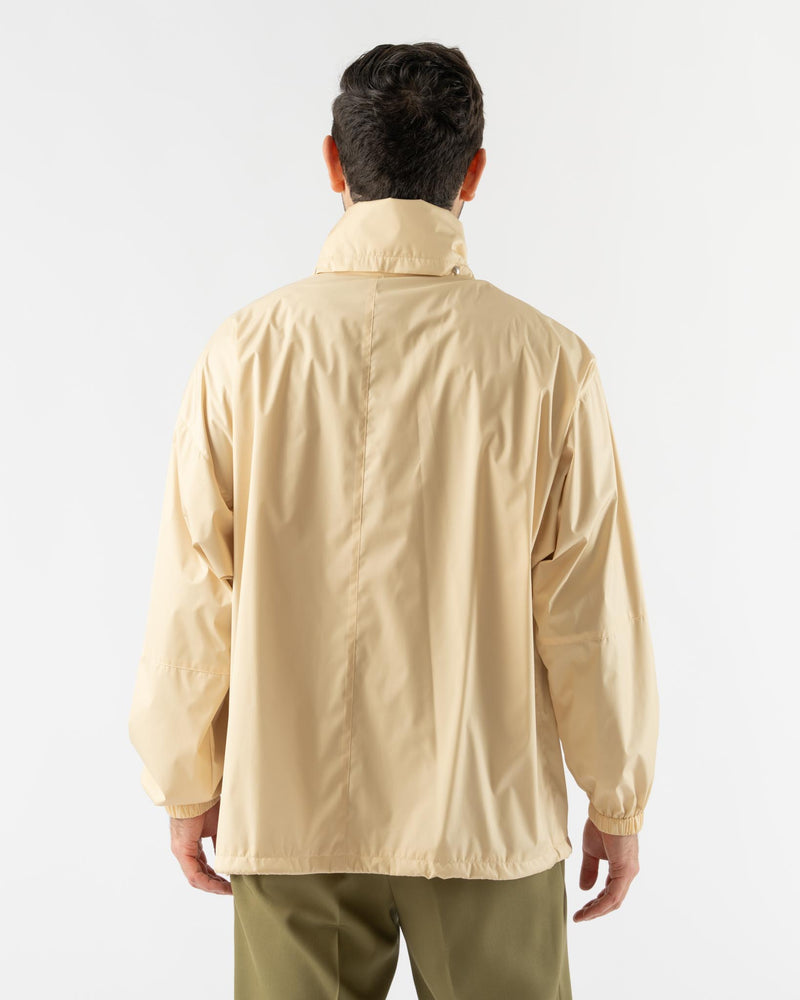 Auralee Hard Twist Polyester Satin Laminate Zip Blouson in Light Beige  Curated at Jake and Jones