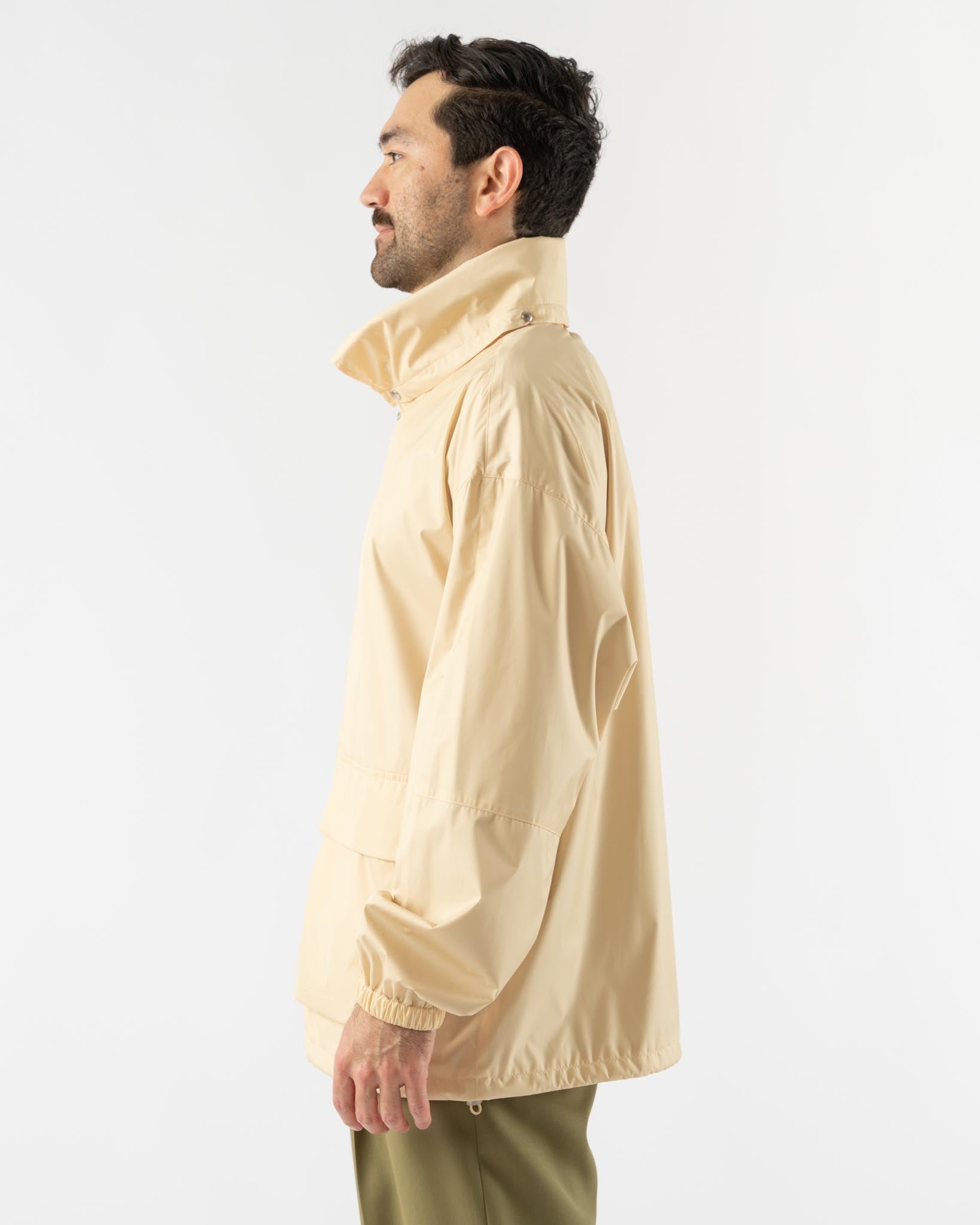 Auralee Hard Twist Polyester Satin Laminate Zip Blouson in Light Beige