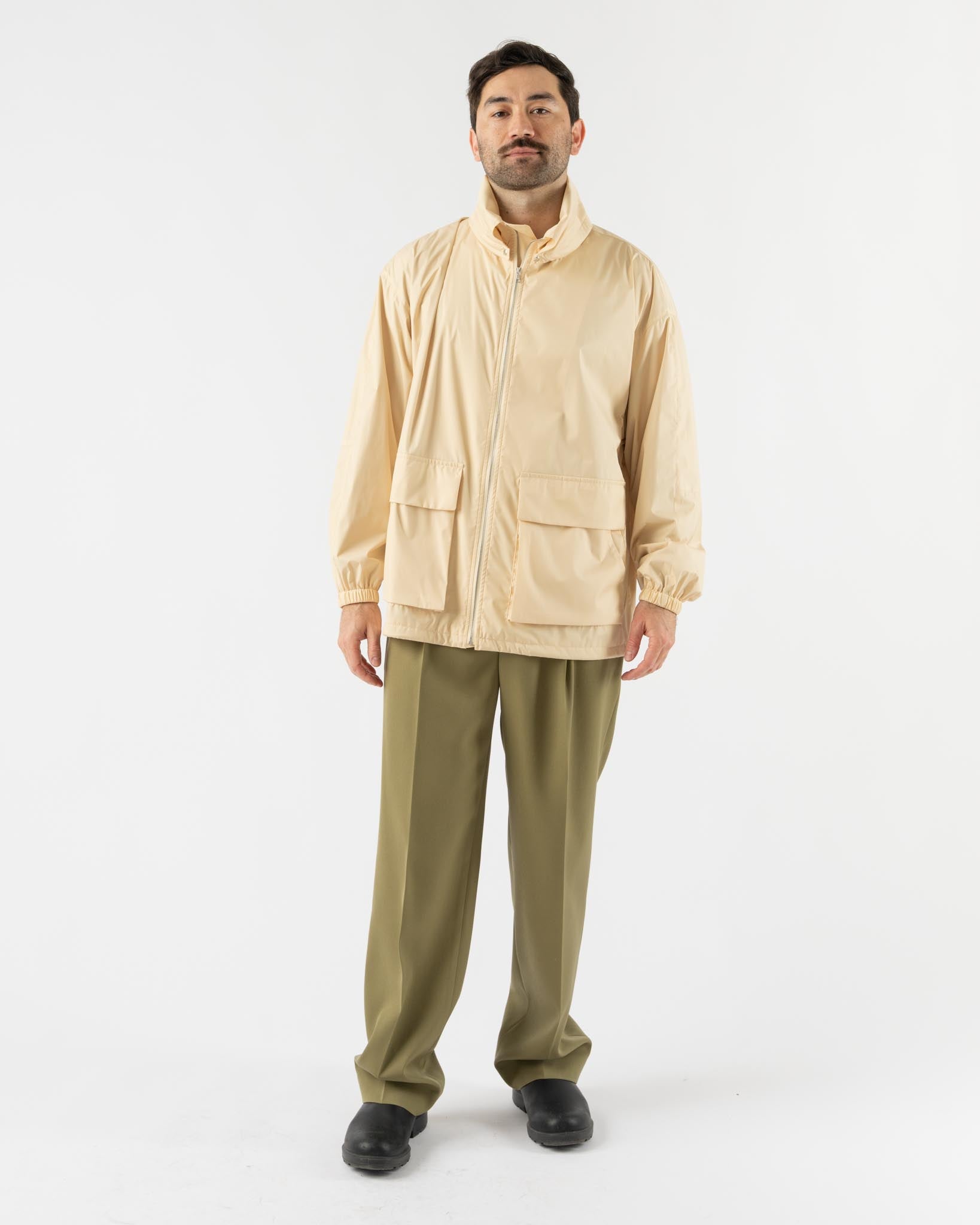 Auralee Hard Twist Polyester Satin Laminate Zip Blouson in Light Beige