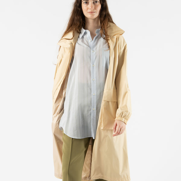 Auralee Hard Twist Polyester Satin Laminate Zip Coat in Light Beige Curated  at Jake and Jones