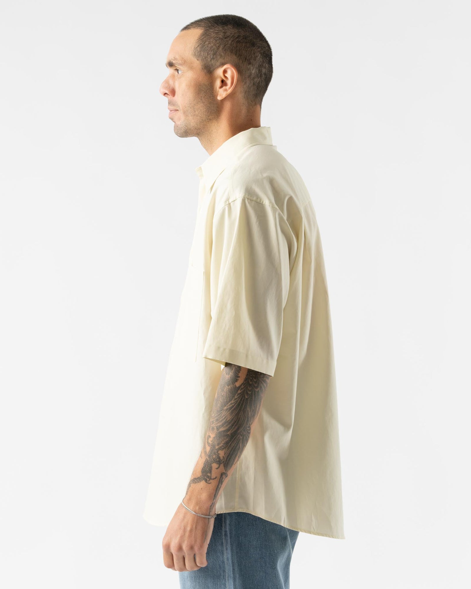 Auralee Washed Finx Twill Big Half Sleeved Shirt in Light Yellow Curated at  Jake and Jones