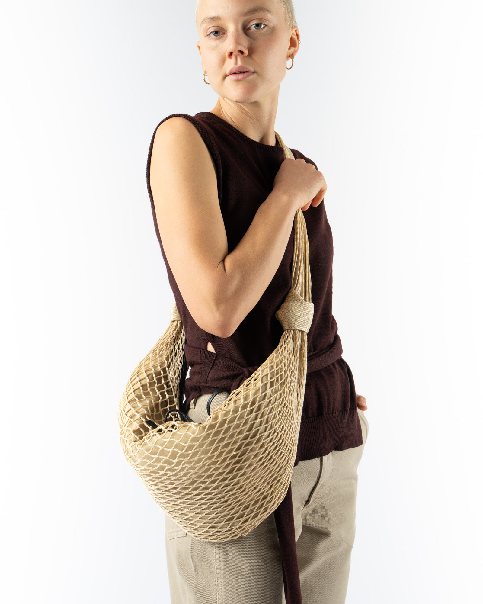Lemaire Light Beige Croissant Filt Bag Curated at Jake and Jones