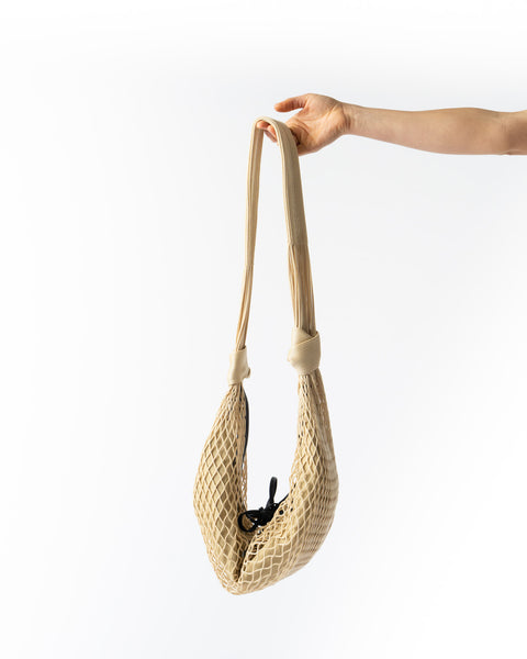 Lemaire Light Beige Croissant Filt Bag Curated at Jake and Jones