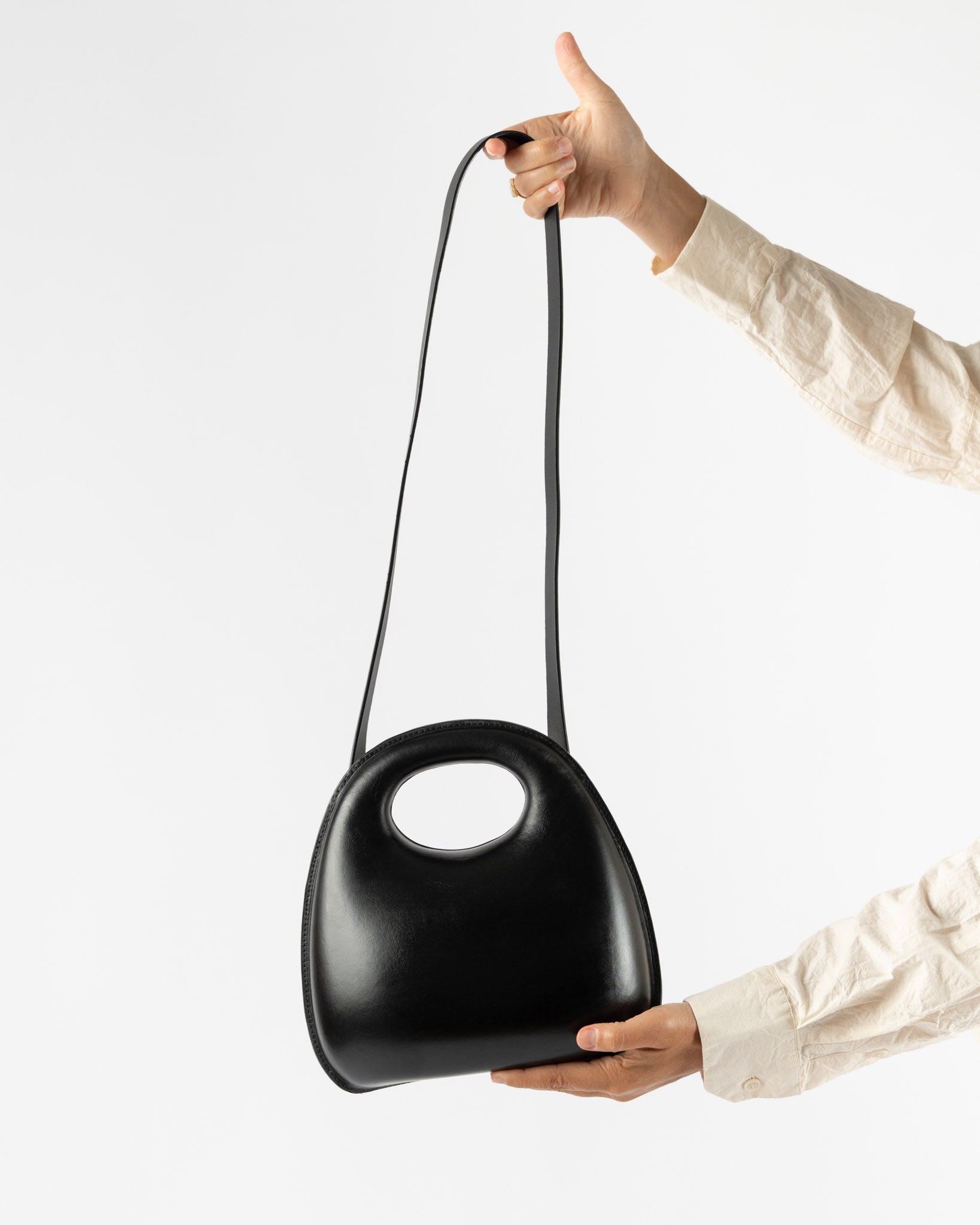 SS25 LEMAIRE◆EGG BAG Lemaire Egg Bag in Black Curated at Jake and Jones