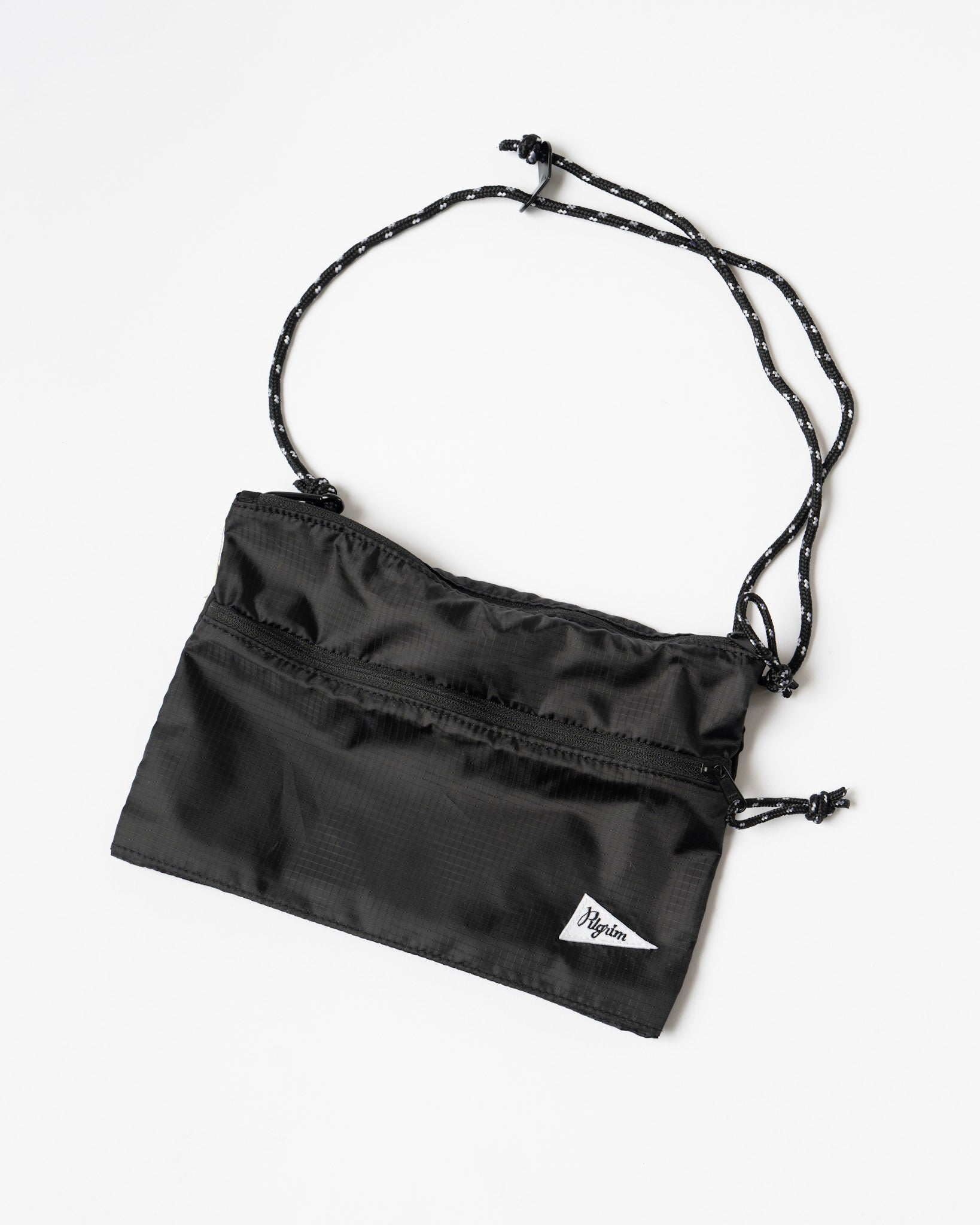 Pilgrim Surf + Supply Ripstop Sacoche in Black/White