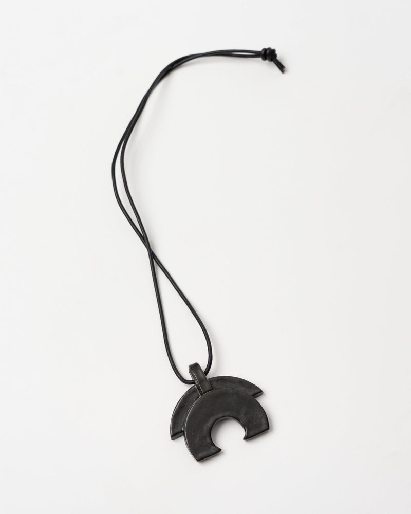 jeanne-ceramics-black-half-moon-necklace-on-black-leather-jake-and-jones-a-santa-barbara-boutique